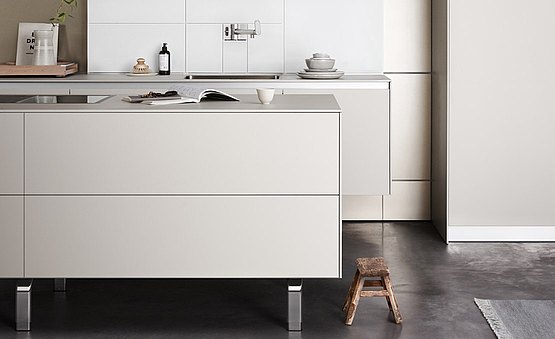 Elevated kitchen island with metal footrests