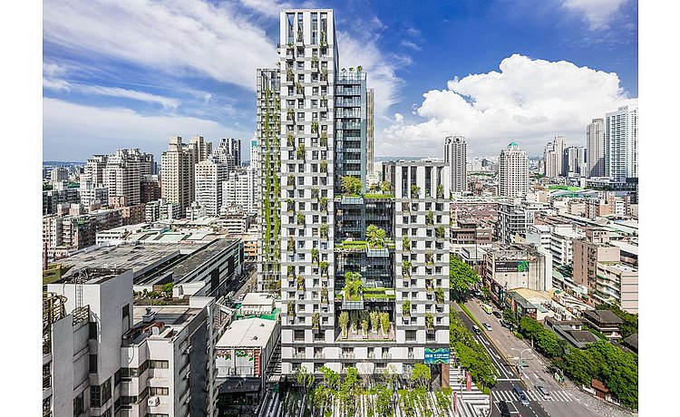 Sky Green skyscraper overgrown with greenery